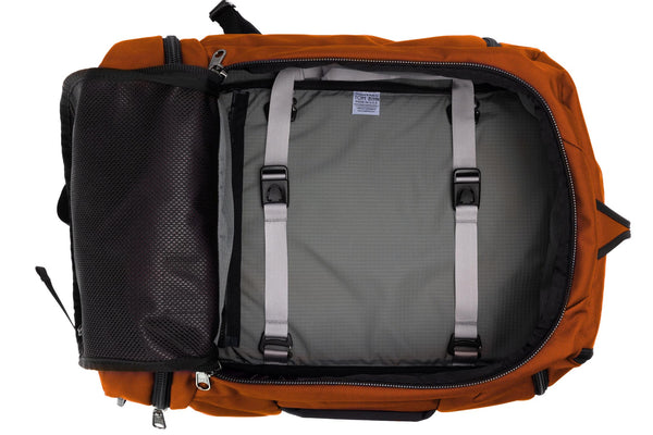 An open Techonaut 45 with a Burnt Orange exterior and a Mountain (grey) interior.